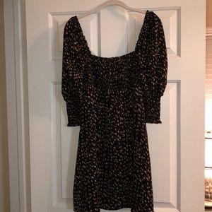 Black patterned dress with sleeves